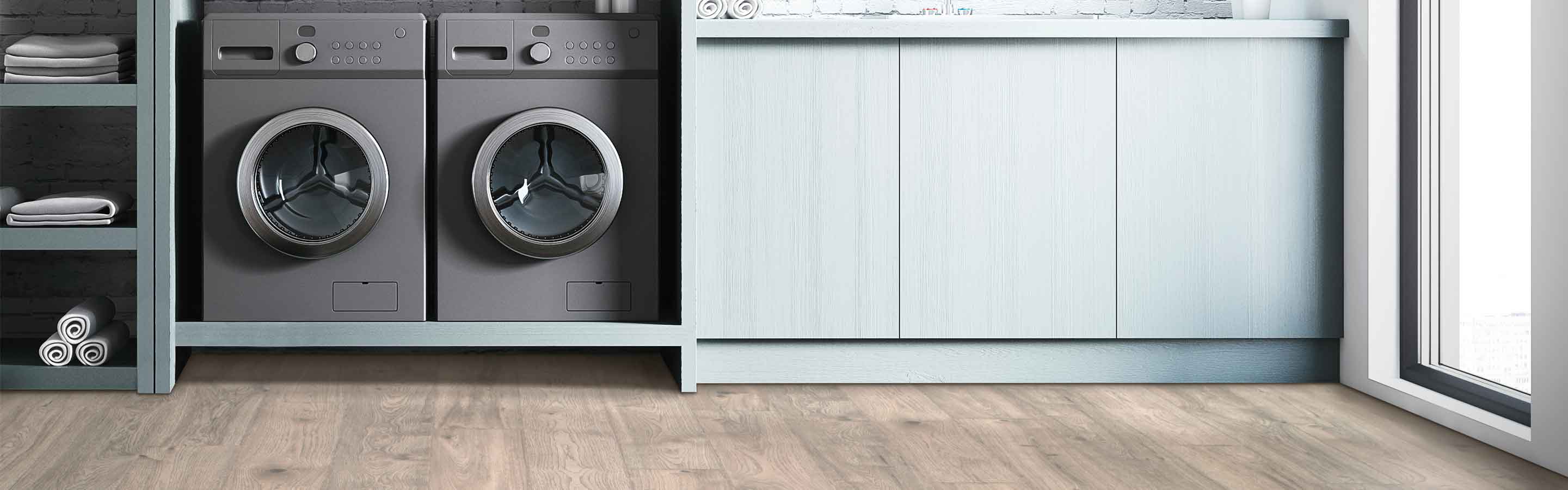 Laminate flooring in a laundry room with built-ins